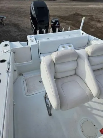 Slide: The Image of 2005 Baja 250 Sportfish Center Console with white seating and outboard motor. - 25