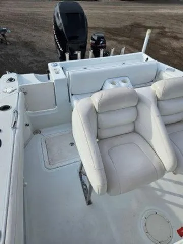 Slide: The Image of 2005 Baja 250 Sportfish Center Console with cushioned seating and outboard motor. - 36