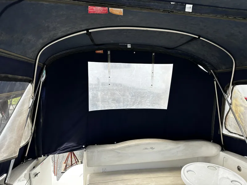 Slide: The Image of 2006 Sea Ray 280 Sundancer interior with canopy and seating area. - 35