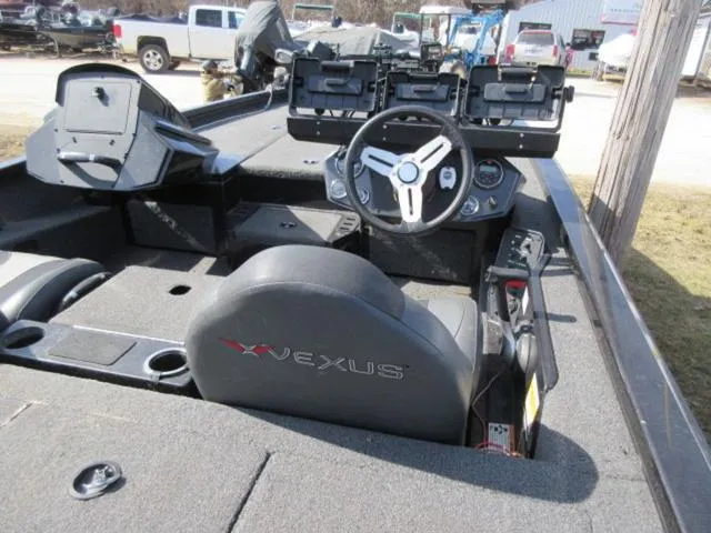 Slide: The Image of 2020 Vexus AVX1980 boat interior with steering wheel and control panel. - 19