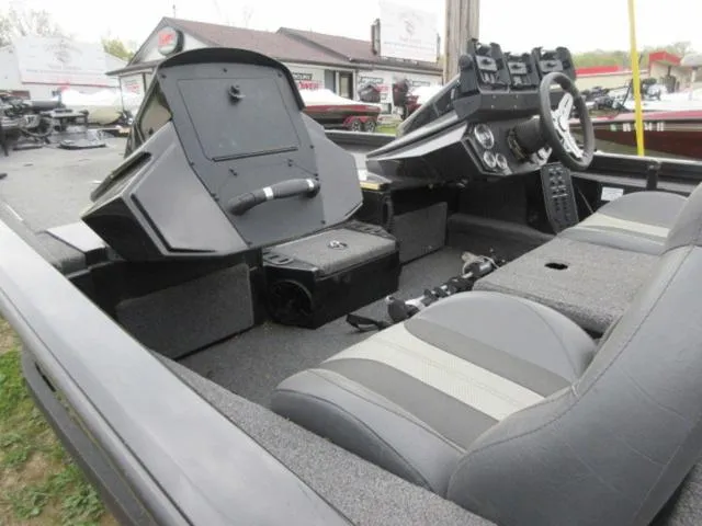 Slide: The Image of 2020 Vexus AVX1980 boat interior with steering console and seating. - 26