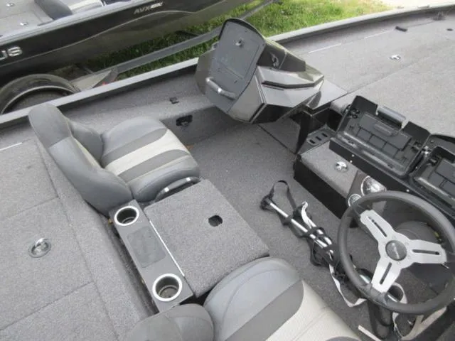 Slide: The Image of 2020 Vexus AVX1980 boat interior with steering wheel, seats, and storage compartments. - 31