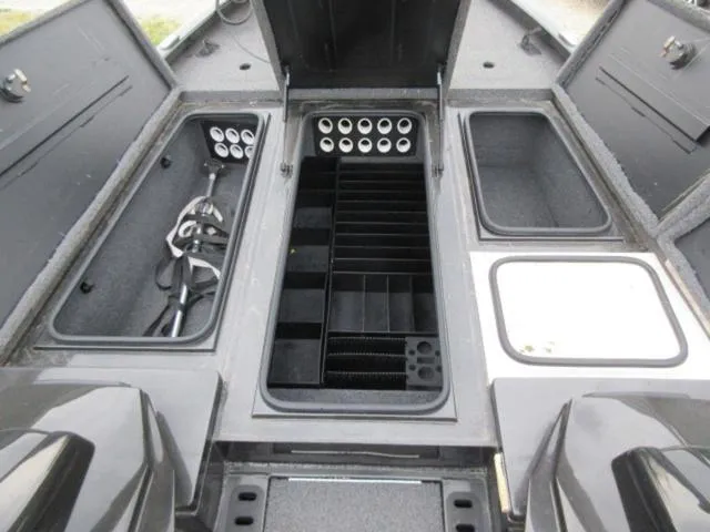 Slide: The Image of 2020 Vexus AVX1980 boat storage compartments with rod holders and tackle organizers. - 7