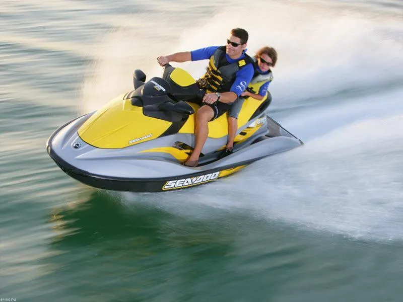 Slide: The Image of 2007 Sea-Doo GTI™ SE 155 jet ski with two riders speeding on water. - 17