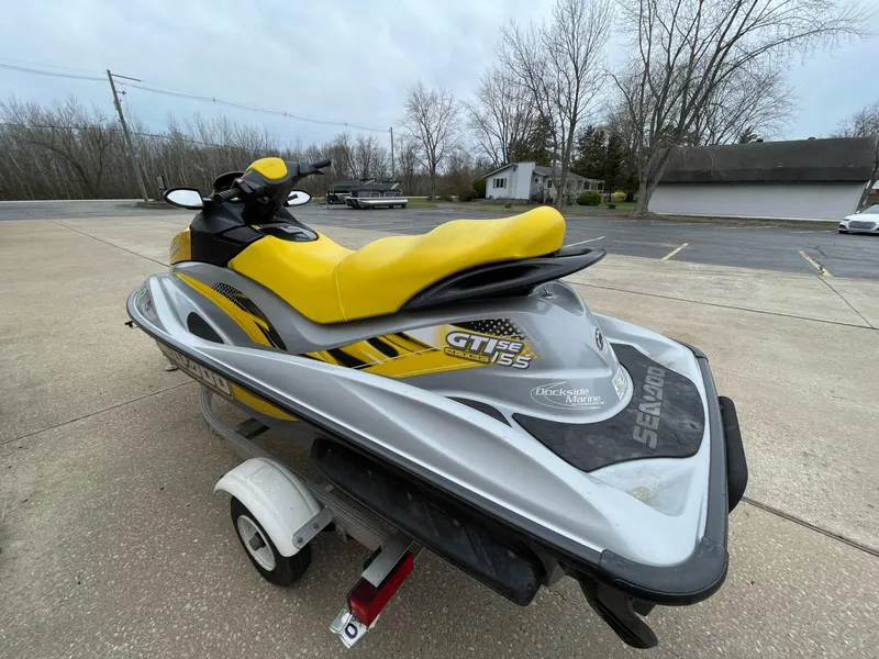 Slide: The Image of 2007 Sea-Doo GTI SE 155 jet ski with yellow seat on a trailer. - 5