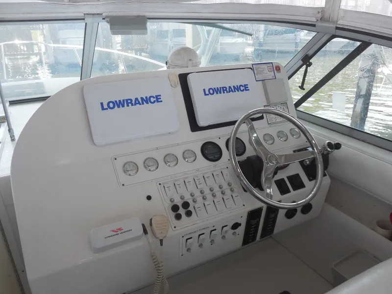 Slide: The Image of Helm of 2005 Stamas 370 Express boat with Lowrance navigation system. - 15
