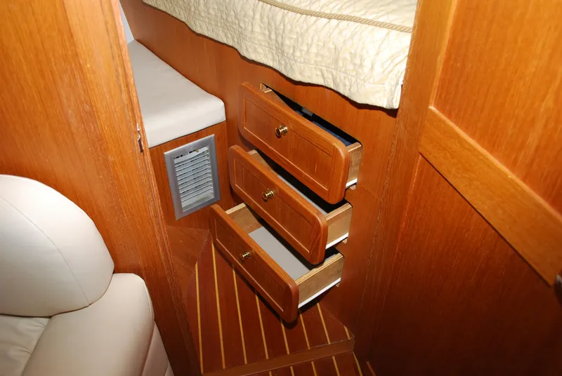 Slide: The Image of Interior of 2005 Stamas 370 Express with wooden drawers and cozy cabin space. - 47