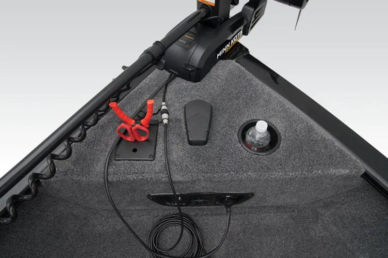 Slide: The Image of 2025 Tracker Pro Guide™ V-175 WT boat interior with trolling motor and cup holder. - 13