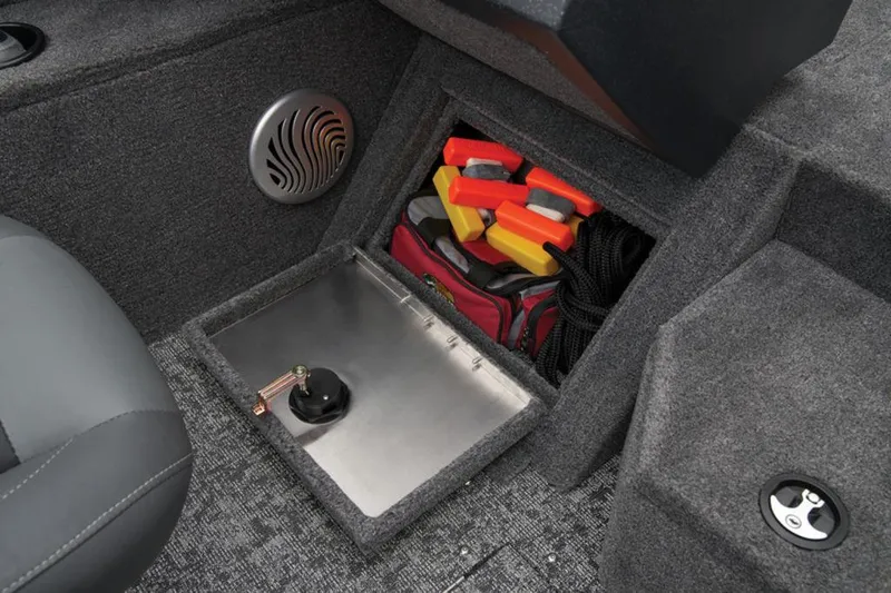 Slide: The Image of 2025 Tracker Pro Guide V-175 WT boat storage compartment with safety gear and accessories. - 23