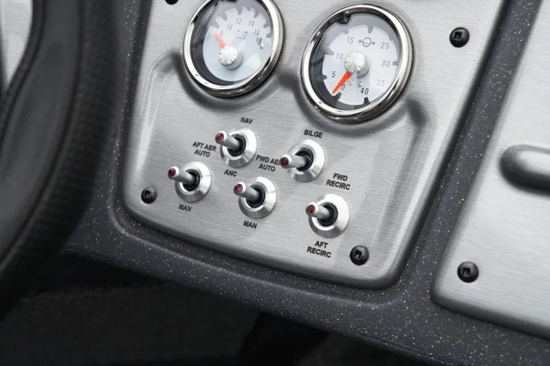 Slide: The Image of Control panel of 2025 Tracker Pro Guide™ V-175 WT boat with gauges and switches. - 30