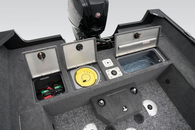 Slide: The Image of 2025 Tracker Pro Guide™ V-175 WT boat interior with storage compartments and motor. - 32