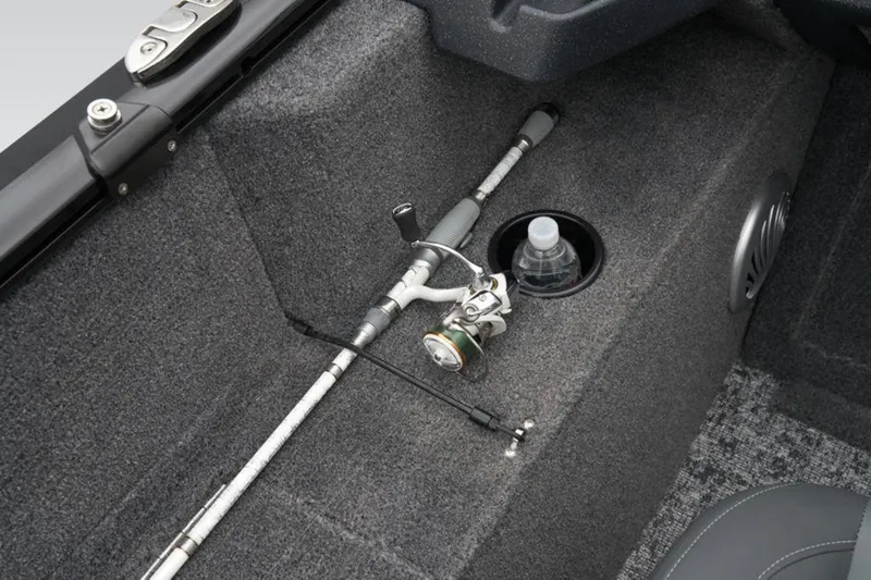 Slide: The Image of 2025 Tracker Pro Guide™ V-175 WT interior with fishing rod and cup holder. - 41