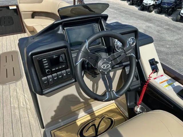 Slide: The Image of Steering console of 2025 Veranda Relax VLC VR25VLC boat with modern controls and dashboard. - 11