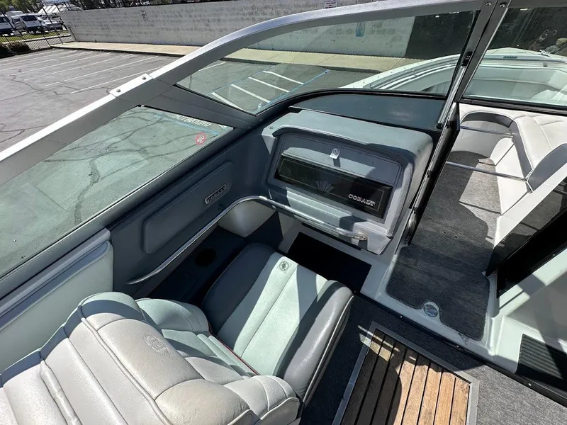 Slide: The Image of 1991 Cobalt Condurre 222 boat interior with seating and dashboard view. - 18