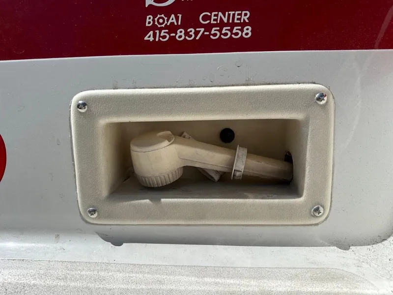 Slide: The Image of Exterior detail of a 1991 Cobalt Condurre 222 boat with a built-in showerhead. - 38