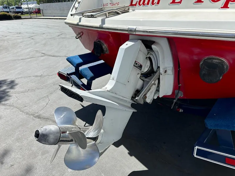 Slide: The Image of Rear view of a 1991 Cobalt Condurre 222 boat with visible propeller and outdrive. - 41