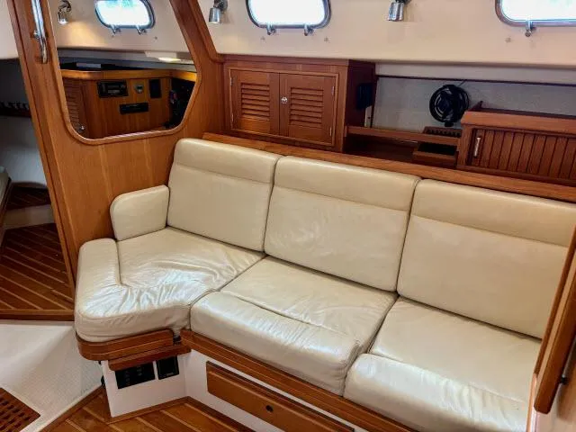 Slide: The Image of Luxurious interior of 2008 Island Packet 370 yacht with cream leather seating. - 6
