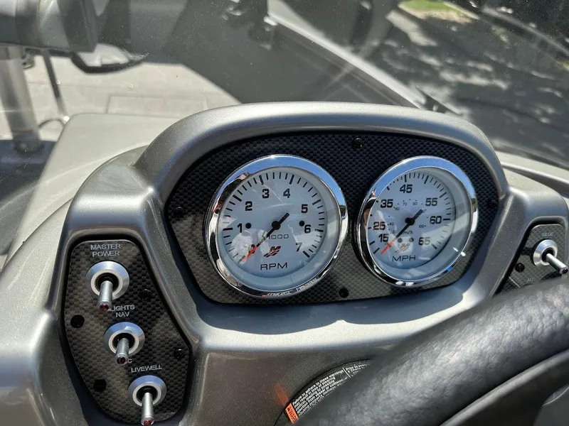 Slide: The Image of Dashboard of a 2017 Crestliner 1600 Vision boat with RPM and MPH gauges. - 20