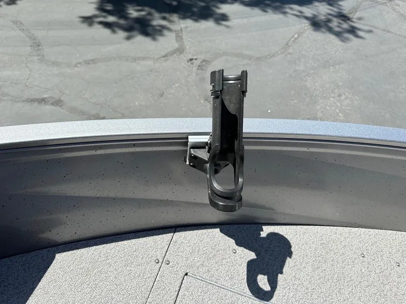 Slide: The Image of 2017 Crestliner 1600 Vision boat with a mounted rod holder on deck. - 27