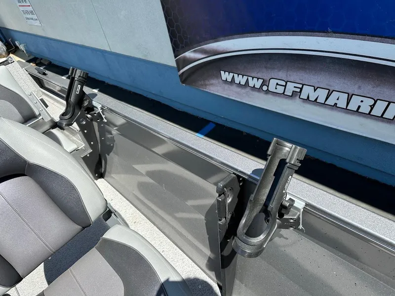 Slide: The Image of 2017 Crestliner 1600 Vision boat interior with rod holders and seating. - 33