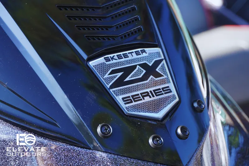 Slide: The Image of 2025 Skeeter ZX150 boat badge close-up with "ZX Series" logo. - 6