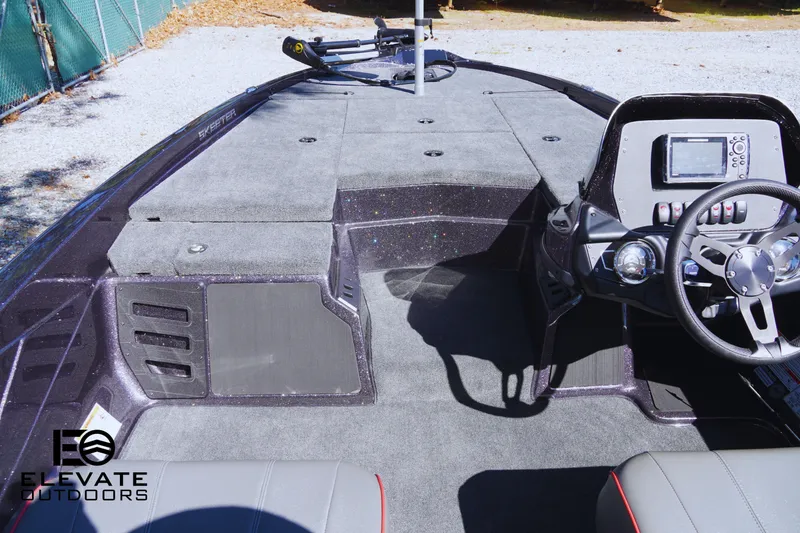 Slide: The Image of 2025 Skeeter ZX150 boat interior with steering console and spacious deck. - 9