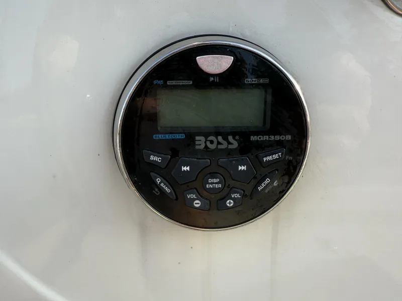 Slide: The Image of Boss MGR350B marine stereo on 2016 Ranger RP 190 boat, featuring Bluetooth and waterproof design. - 15