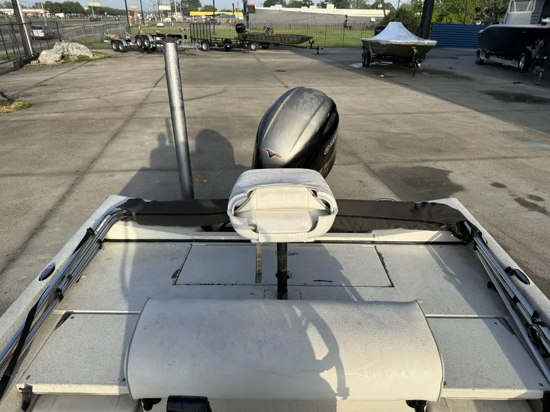 Slide: The Image of 2016 Ranger RP 190 boat with motor, parked on concrete lot. - 8