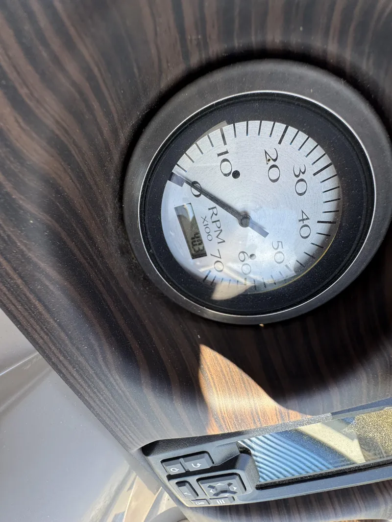 Slide: The Image of Tachometer on 2022 Bennington 22 SXSR boat dashboard, displaying RPM readings. - 12