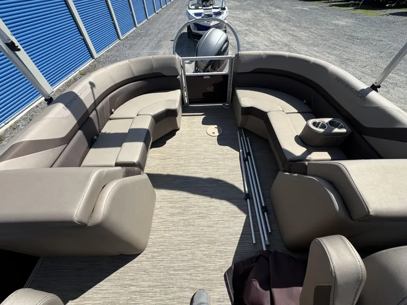Slide: The Image of 2022 Bennington 22 SXSR pontoon boat interior with spacious seating and cup holders. - 9