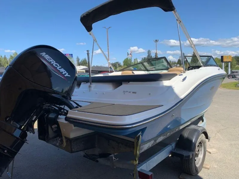 Slide: The Image of 2022 Sea Ray SPX 190 OB boat with Mercury outboard motor on trailer. - 4
