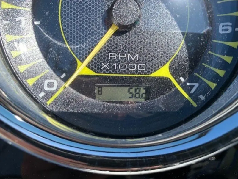 Slide: The Image of Close-up of 2022 Sea Ray SPX 190 OB tachometer displaying 582 RPM. - 8