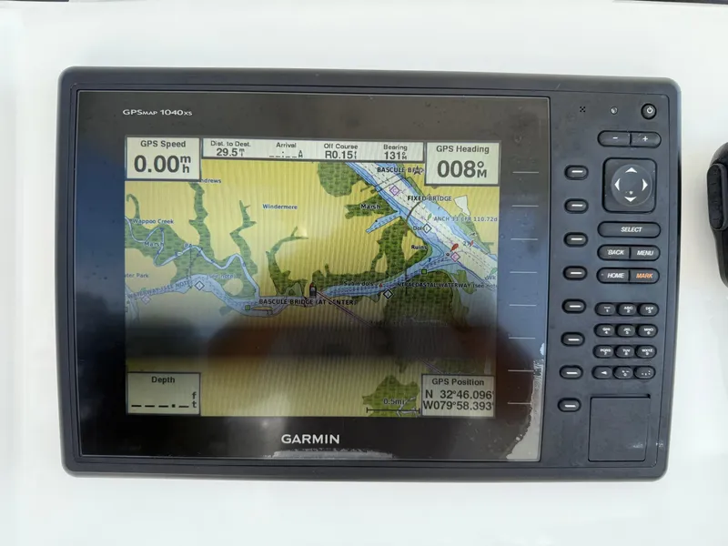 Slide: The Image of Garmin GPS display on 2016 Regulator 23 boat, showing navigation map and coordinates. - 12