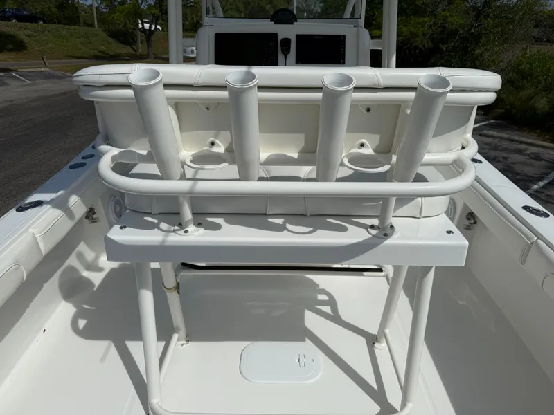 Slide: The Image of 2016 Regulator 23 boat with rod holders and seating, viewed from the deck. - 19