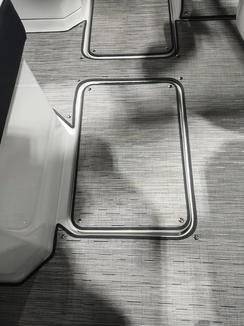 Slide: The Image of 2025 Cobalt R6 Surf boat interior flooring with sleek, modern design. - 16