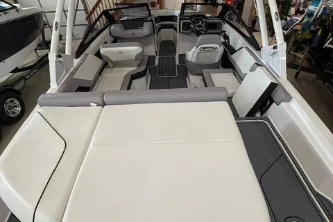 Slide: The Image of 2025 Cobalt CS22 boat interior with spacious seating and modern design. - 12