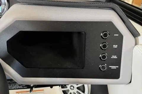 Slide: The Image of Dashboard controls of a 2025 Cobalt CS22 boat, featuring various function buttons. - 17
