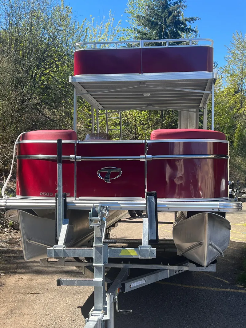 Slide: The Image of 2023 Tahoe Pontoon Cascade Cruise Funship, red, on trailer, outdoors. - 19