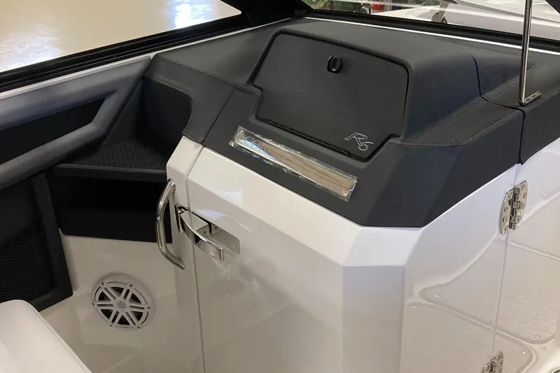 Slide: The Image of 2025 Cobalt R6 boat interior with sleek dashboard and modern design. - 14