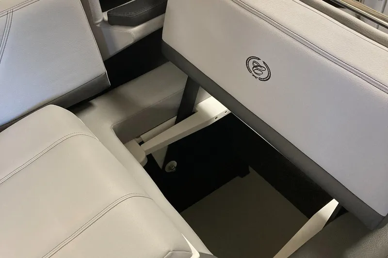 Slide: The Image of 2025 Cobalt R6 interior seating with storage compartment, featuring sleek design and premium materials. - 8