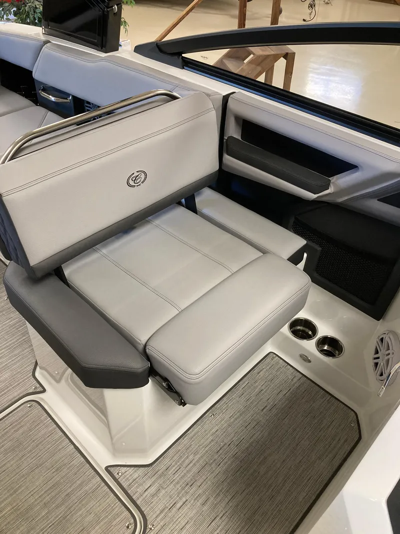 Slide: The Image of 2025 Cobalt R6 boat interior with sleek gray seating and modern design. - 9