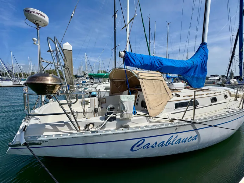 Slide: The Image of 1979 Irwin Citation 39 sailboat named Casablanca docked in a marina. - 1