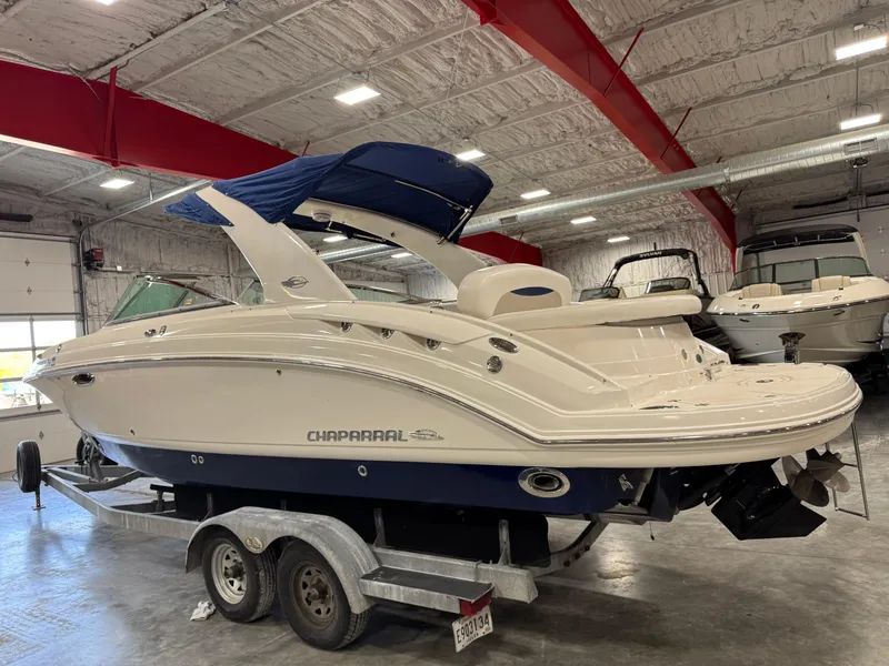 Slide: The Image of 2009 Chaparral 276 SSX boat on trailer in indoor storage facility. - 4