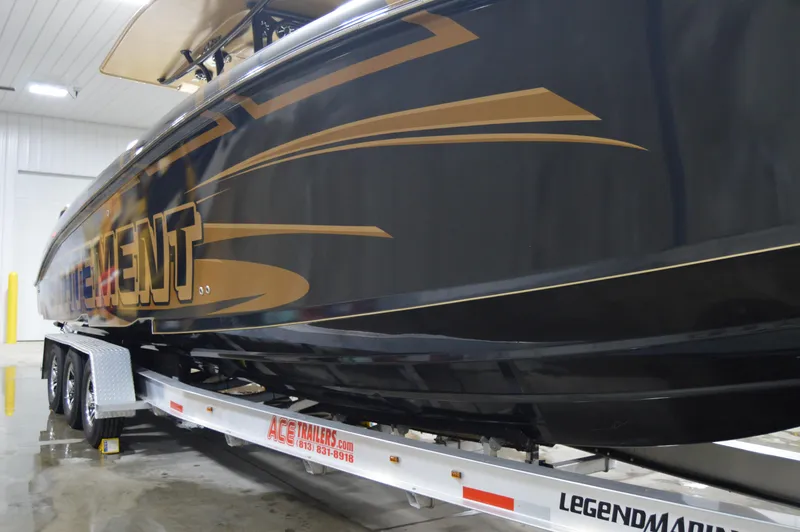 Slide: The Image of 2017 Statement 380 Open boat on trailer in indoor storage. - 16