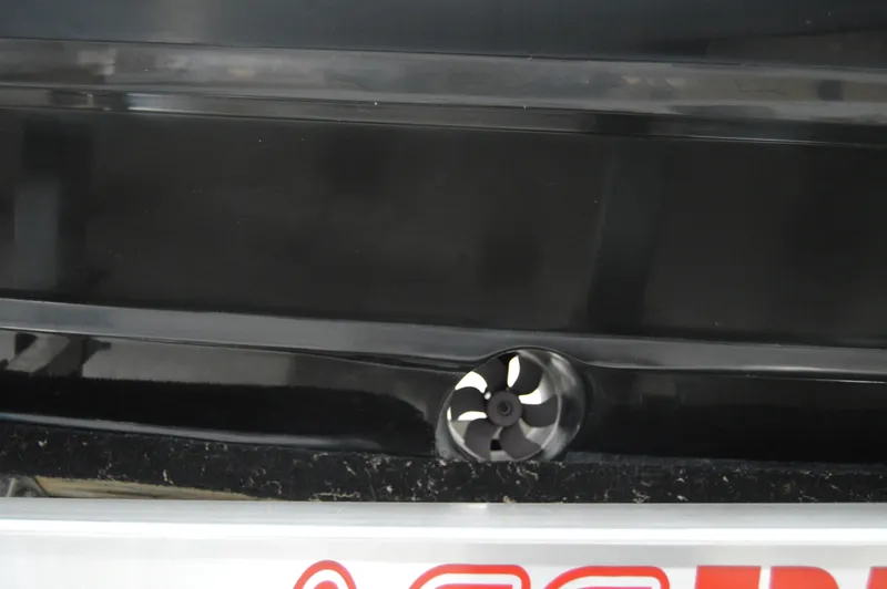 Slide: The Image of 2017 Statement 380 Open boat detail with visible propeller component. - 2