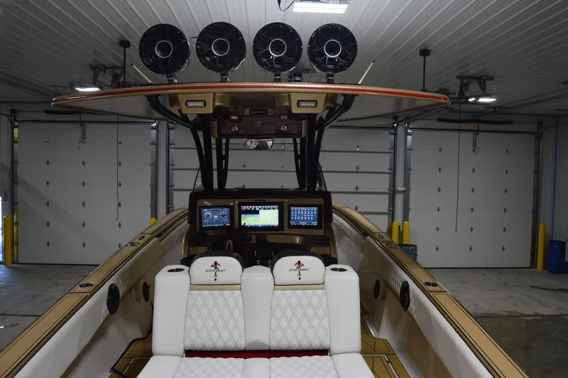 Slide: The Image of Interior view of 2017 Statement 380 Open boat with advanced navigation systems. - 24