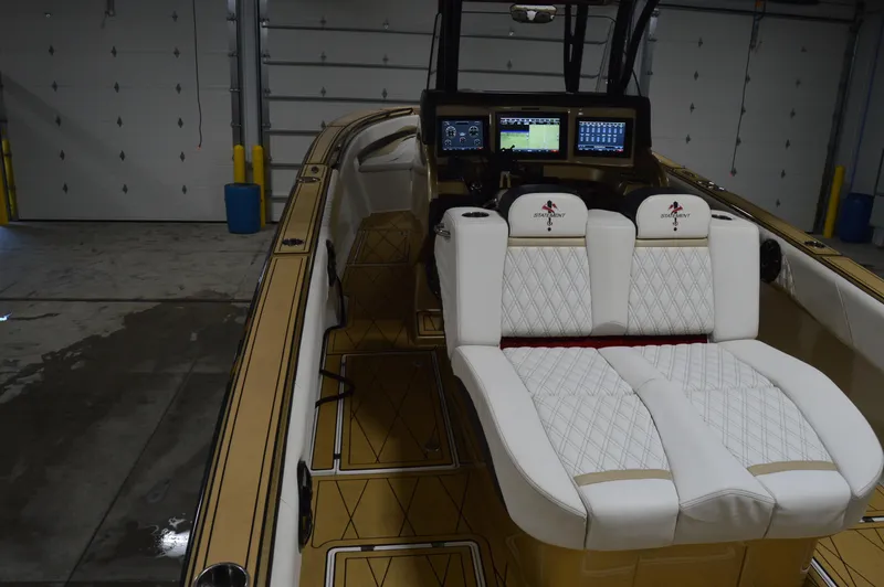 Slide: The Image of Interior of 2017 Statement 380 Open boat with luxurious seating and advanced navigation displays. - 25
