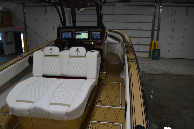 Slide: The Image of Luxury interior of 2017 Statement 380 Open boat with plush seating and advanced controls. - 27
