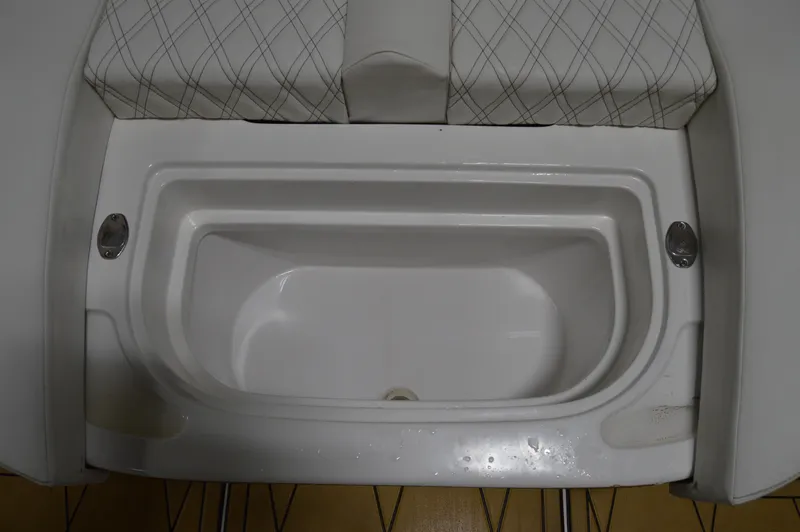 Slide: The Image of 2017 Statement 380 Open boat storage compartment with cushioned seating. - 31