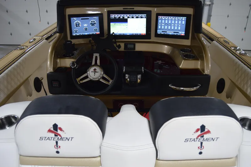 Slide: The Image of Cockpit of 2017 Statement 380 Open boat with advanced navigation displays and controls. - 38